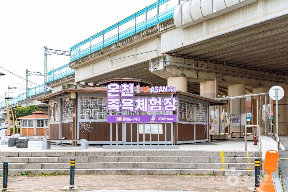 Relaxing hot spring bath facility with steaming mineral water pools in Onyang, South Korea