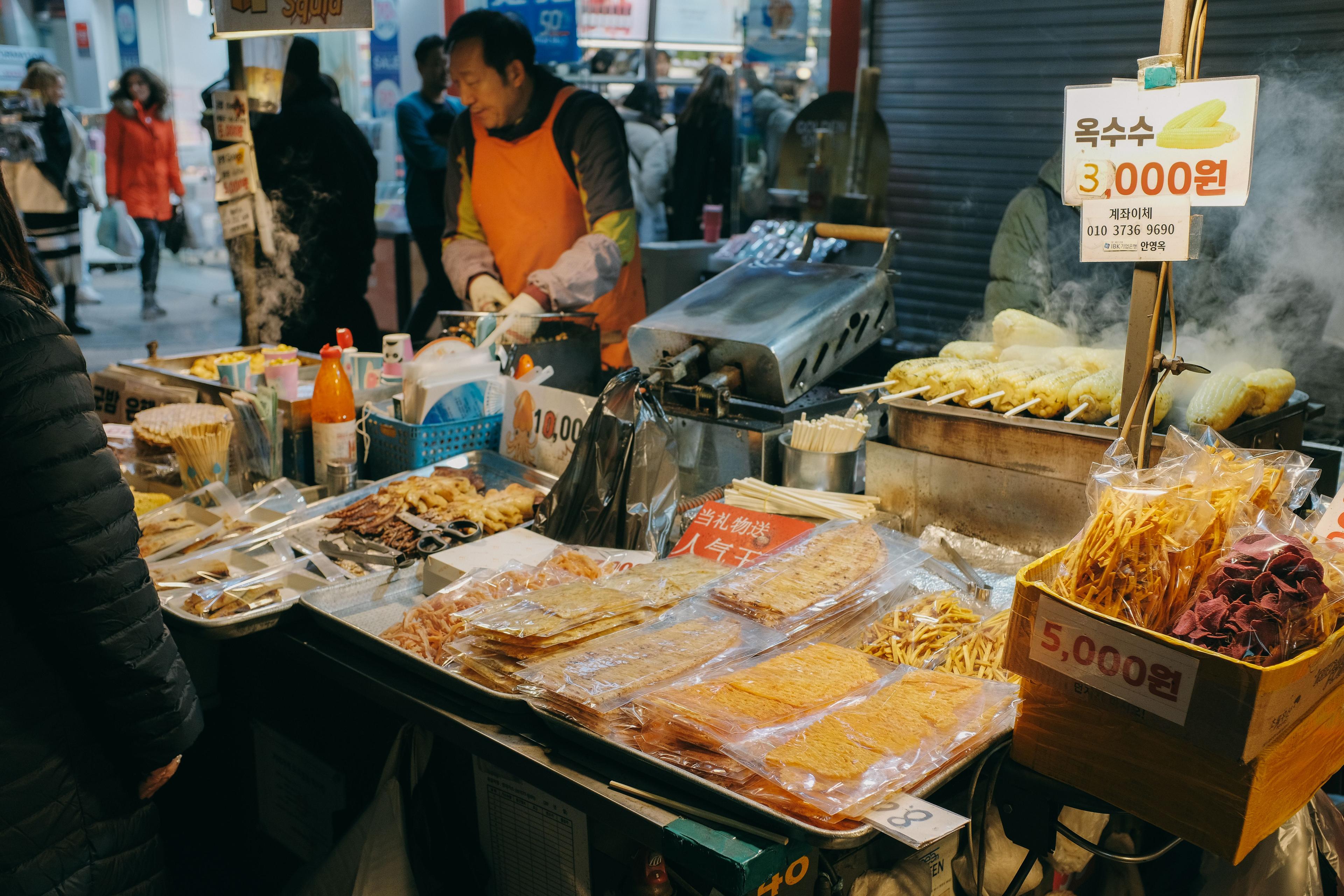 Colorful Korean street food market stall with traditional snacks and street food in South Korea
