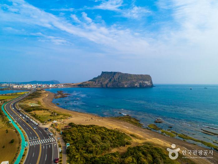 Seongsan Ilchulbong tuff crater viewed from the rim, showing the dramatic volcanic landscape of Jeju Island
