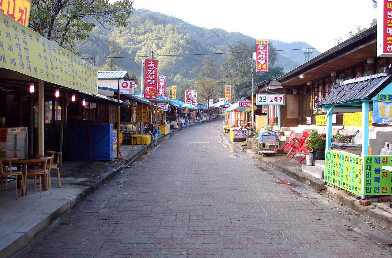 Winding two-lane road through forested mountains in Gangwon-do leading to Odaesan National Park