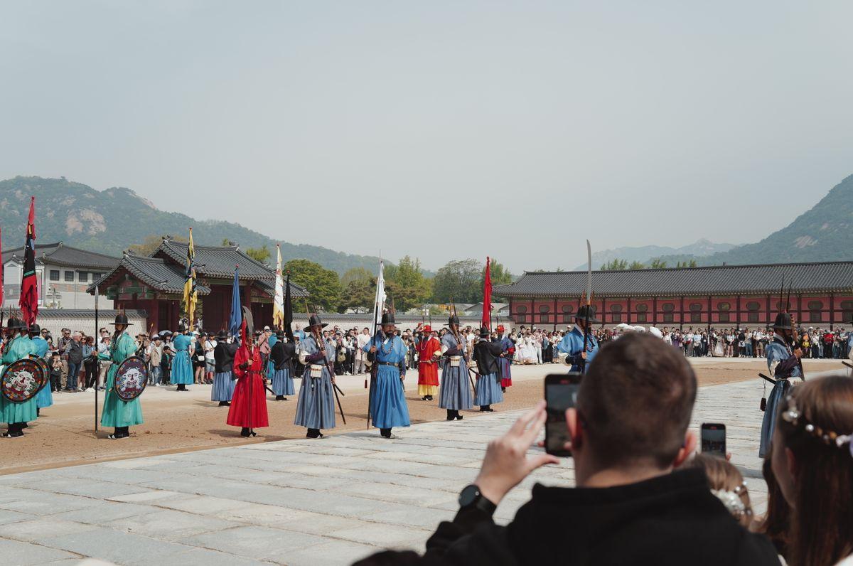 Royal Guard Changing Ceremony at Gyeongbokgung Palace with guards in traditional Joseon military uniforms