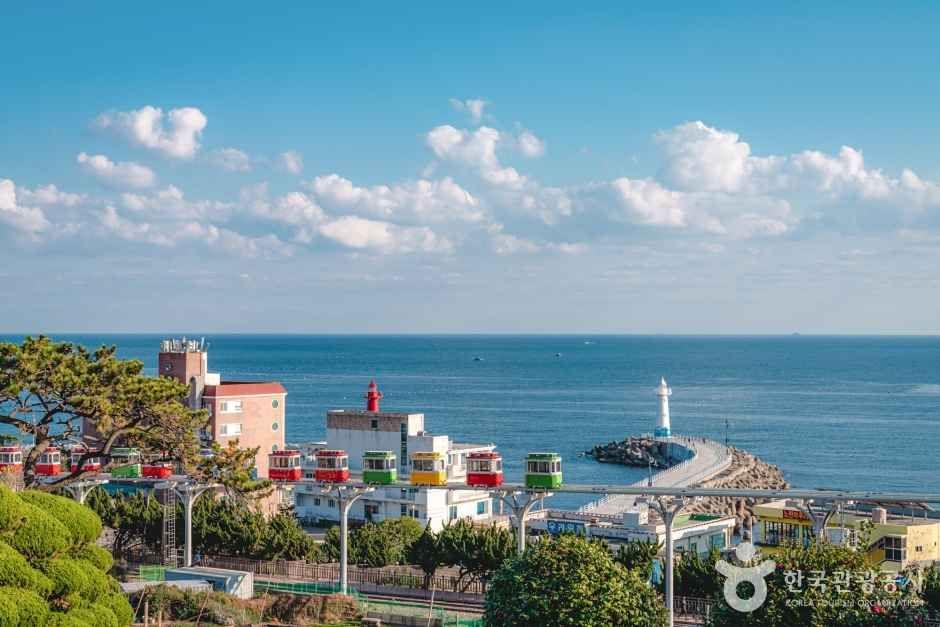 Haeundae Blueline Park sky capsule traveling along coastal cliffs above the East Sea in Busan
