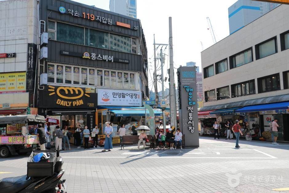 Haeundae Traditional Market in Busan with street food stalls and seafood vendors