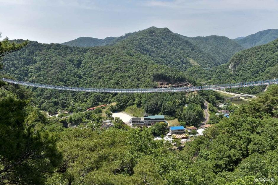 Sogumsan skywalk bridge over a dramatic rocky gorge and river valley in Wonju