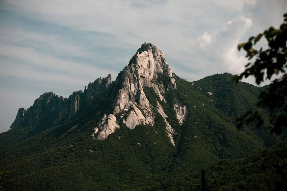 Rugged mountain peaks with lush summer greenery in a Korean national park